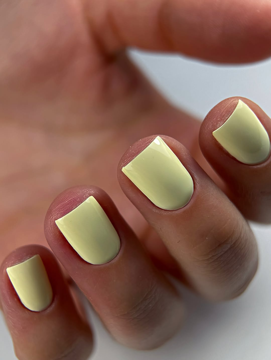 Pastel Yellow Glossy Short Square Nails