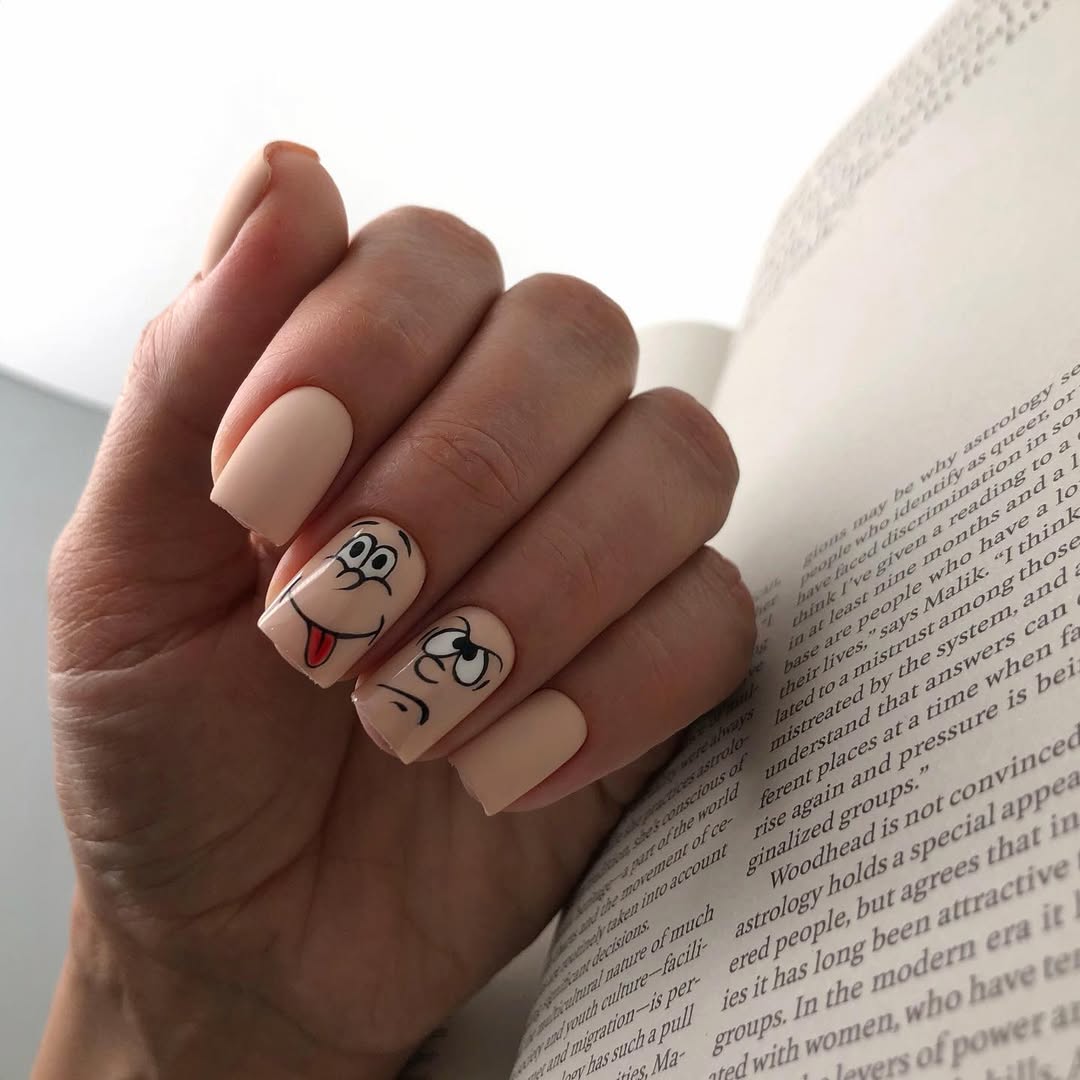 Playful Nude Cartoon Face Matte Nails