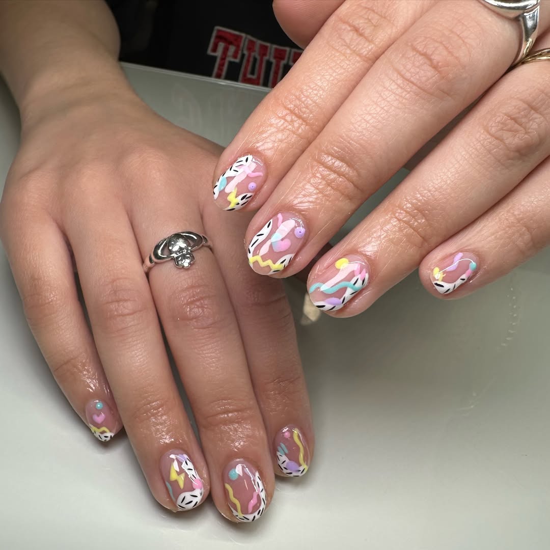 Playful Pastel Abstract Swirls on Clear Oval Nails