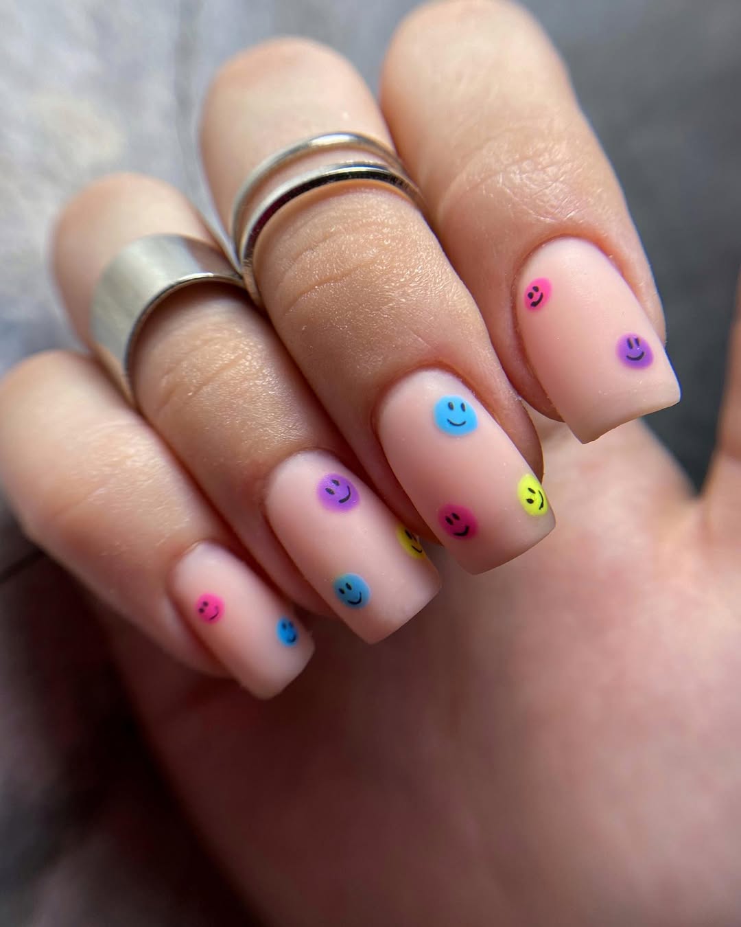 Playful Pastel Matte Squoval Nails With Neon Smiley Faces