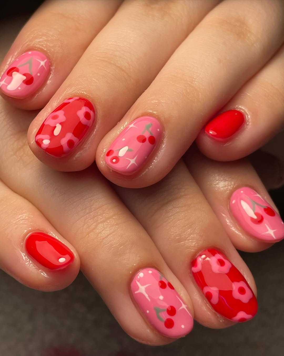 Playful Red and Pink Cherry Blossom Nails