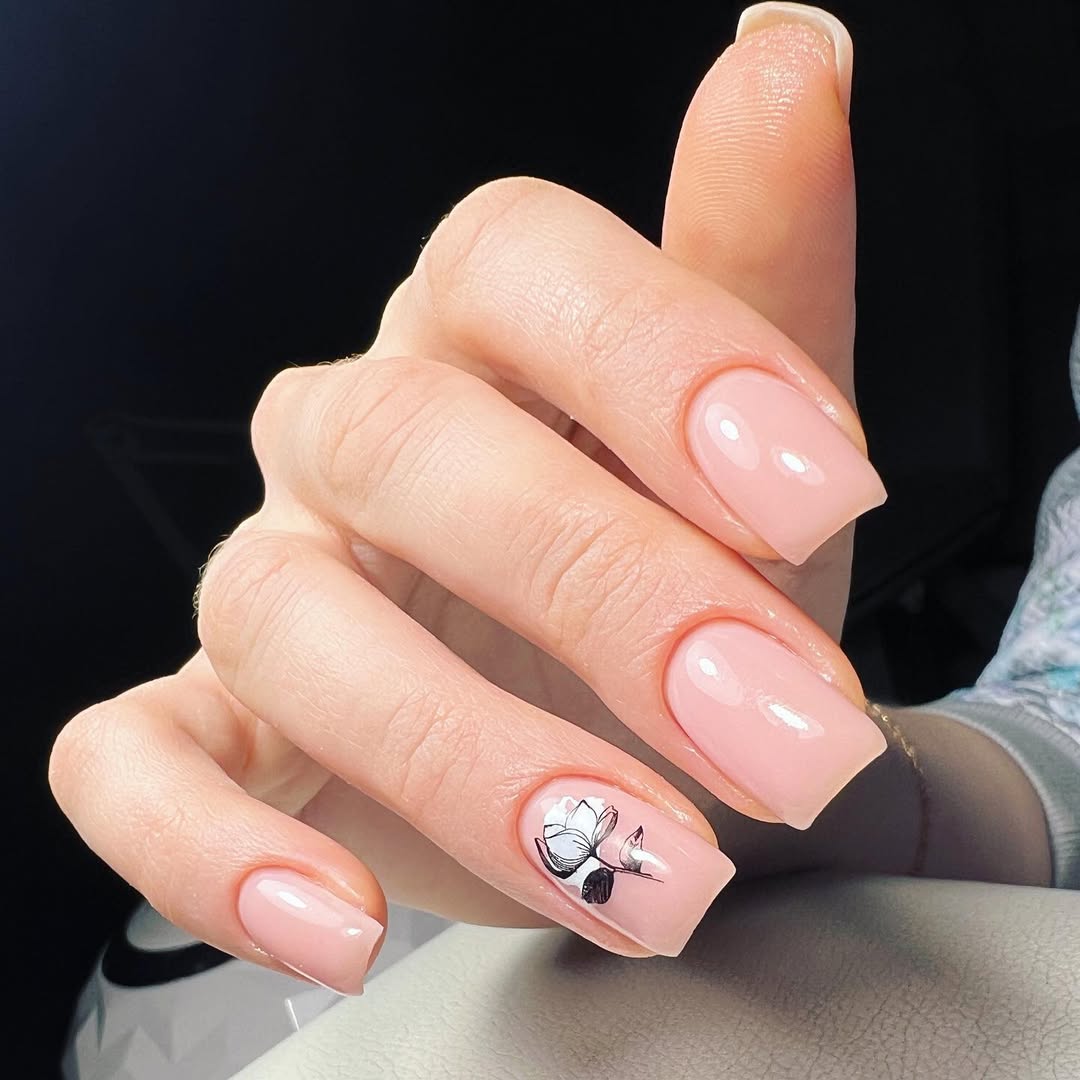 Soft Pink Glossy Squoval Nails with Black and White Flower Art