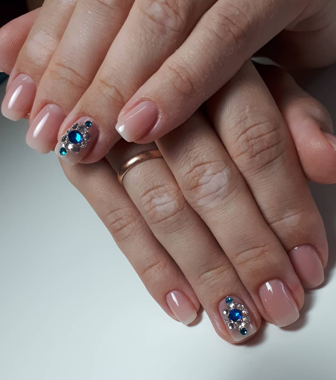 Soft Pink Squoval Nails With Blue Rhinestone Cluster