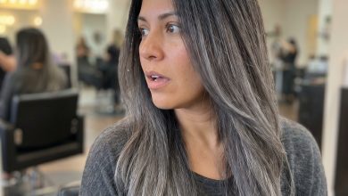 This edgy Soft Charcoal Ombre hair showcases the soft summer palette hair 2026 trend. Features deep charcoal roots blending to ash grey and silver mist ends, perfectly neutralized with purple shampoo for a modern, dramatic effect.