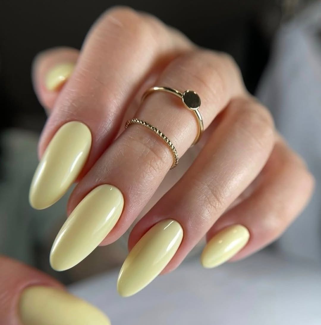 Soft Yellow Glossy Oval Gel Nails