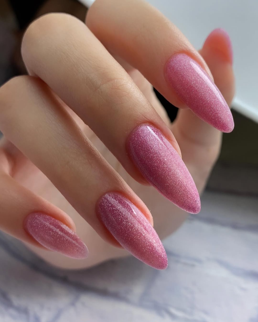 Sparkling Pink Cat Eye Almond Nails