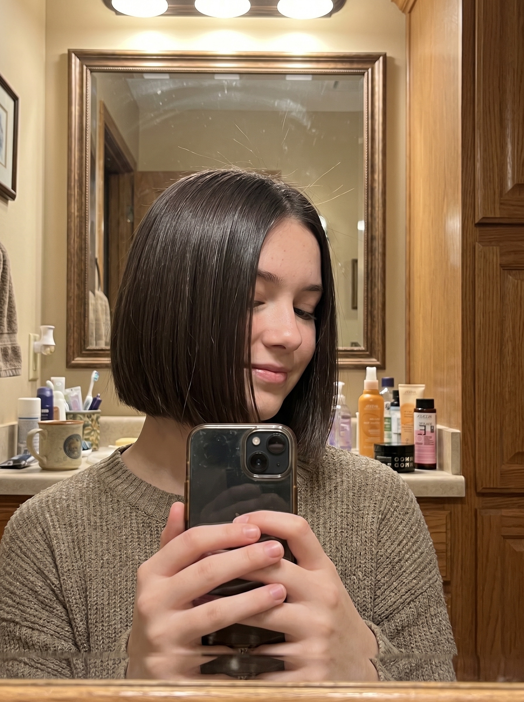 Sophisticated Hydro-Bob with Espresso Glaze, a sleek summer hairstyle teenage girls 2026 can wear for date nights or special events. Features deep brunette color.
