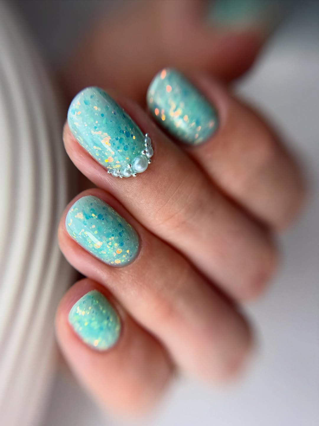 Teal Glitter Oval Nails with Pearl Accents