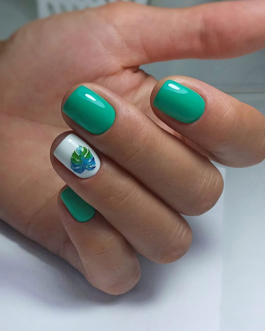 Tropical Teal and Monstera Leaf Nail Art