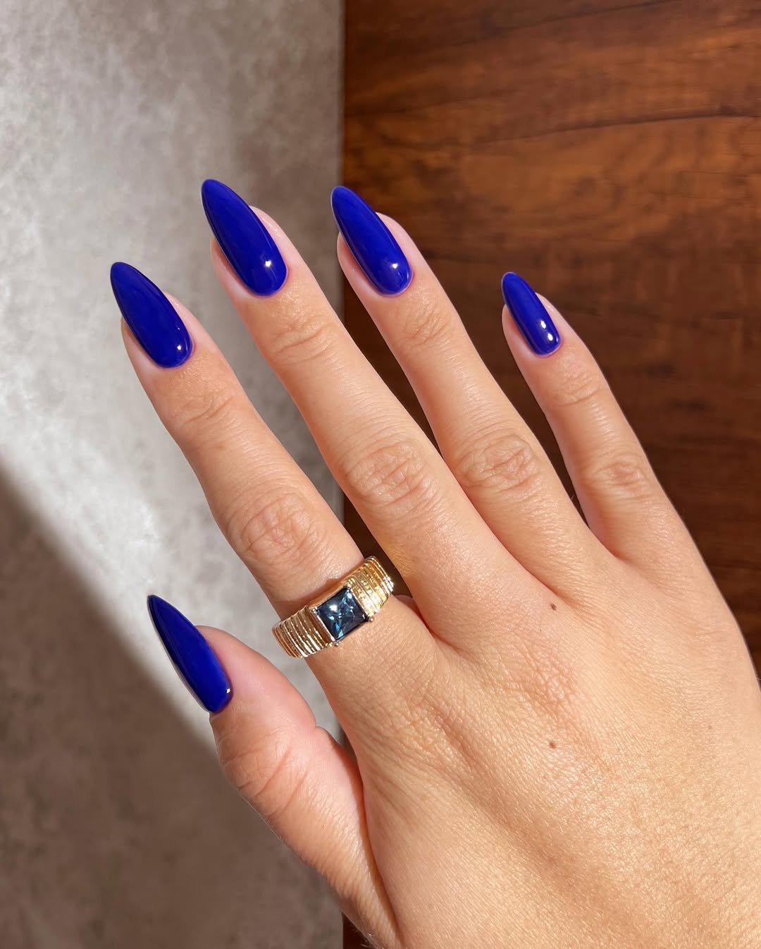 Vibrant Glossy Cobalt Blue Stiletto Nails