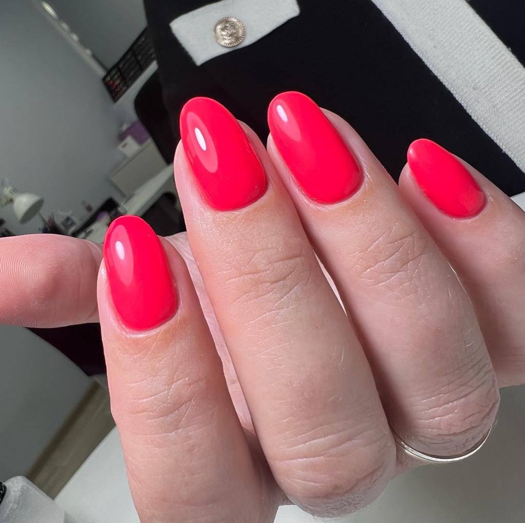 Vibrant Glossy Hot Pink Oval Gel Nails