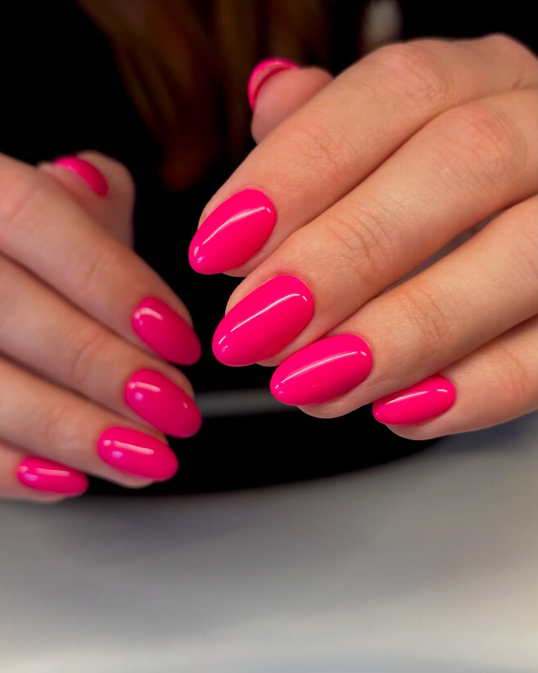 Vibrant Hot Pink Glossy Oval Nails