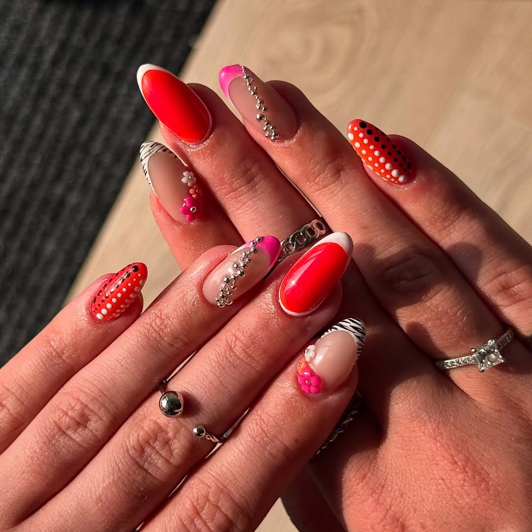 Vibrant Mismatched French Tips with 3D Flower Accents