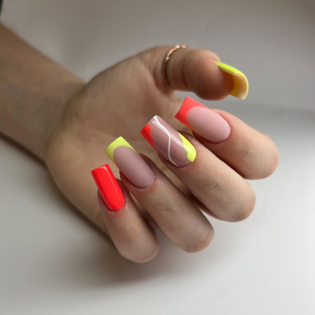 Vibrant Neon French Tips with Abstract Swirl Accent