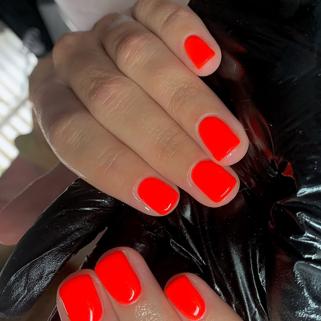 Vibrant Neon Orange Glossy Short Round Nails