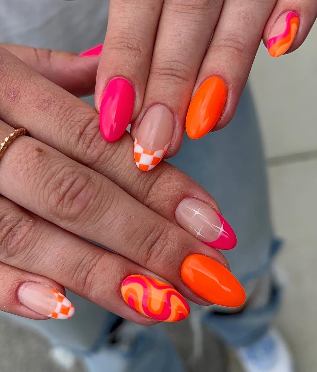 Vibrant Neon Orange Pink Swirl Checkerboard Nails