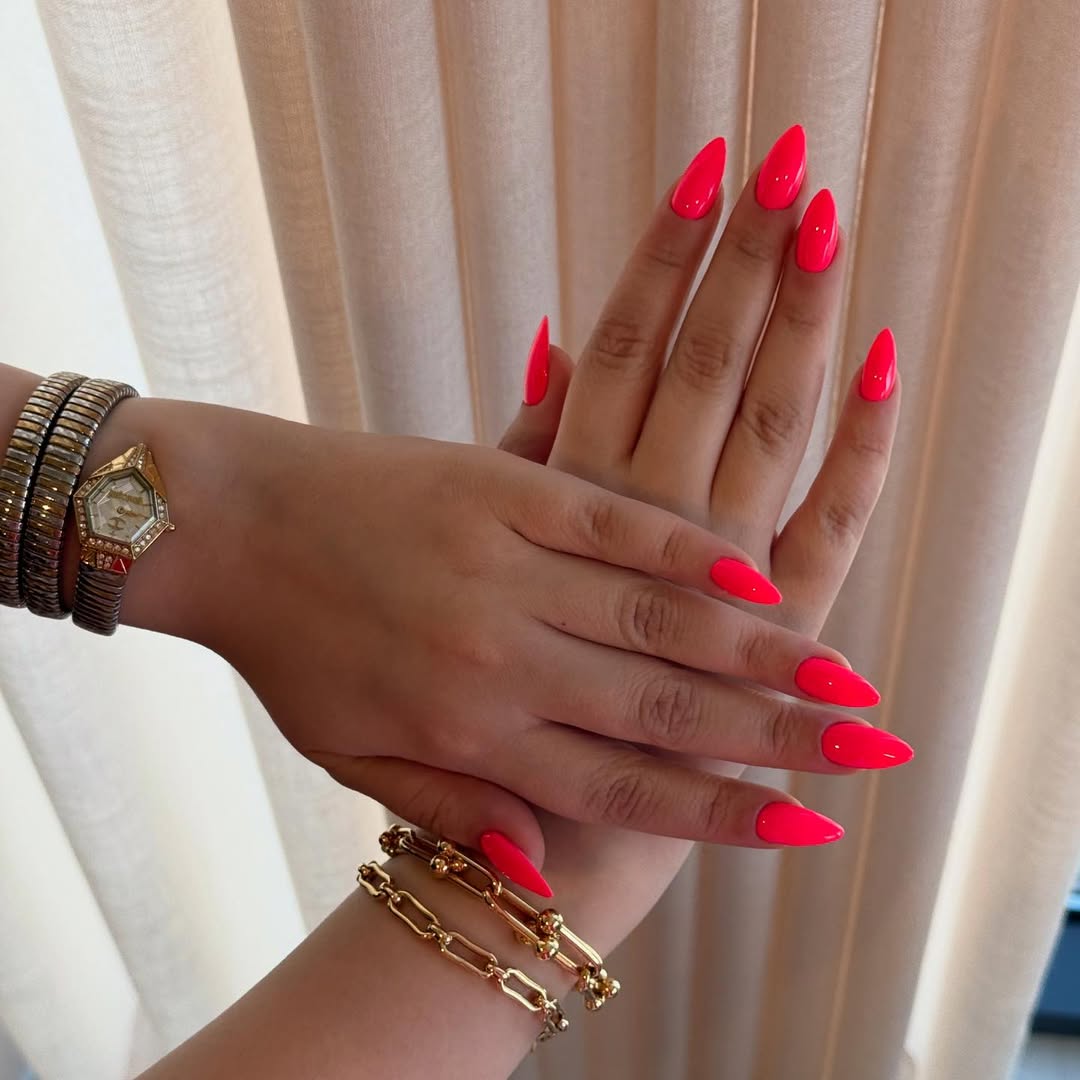 Vibrant Neon Pink Glossy Stiletto Nails