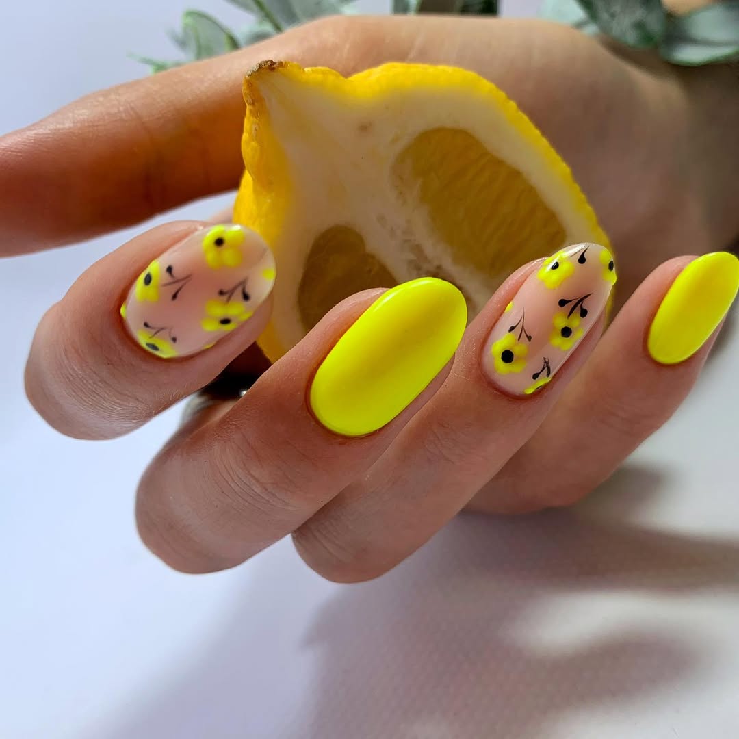 Vibrant Neon Yellow Oval Nails With Daisy Accents