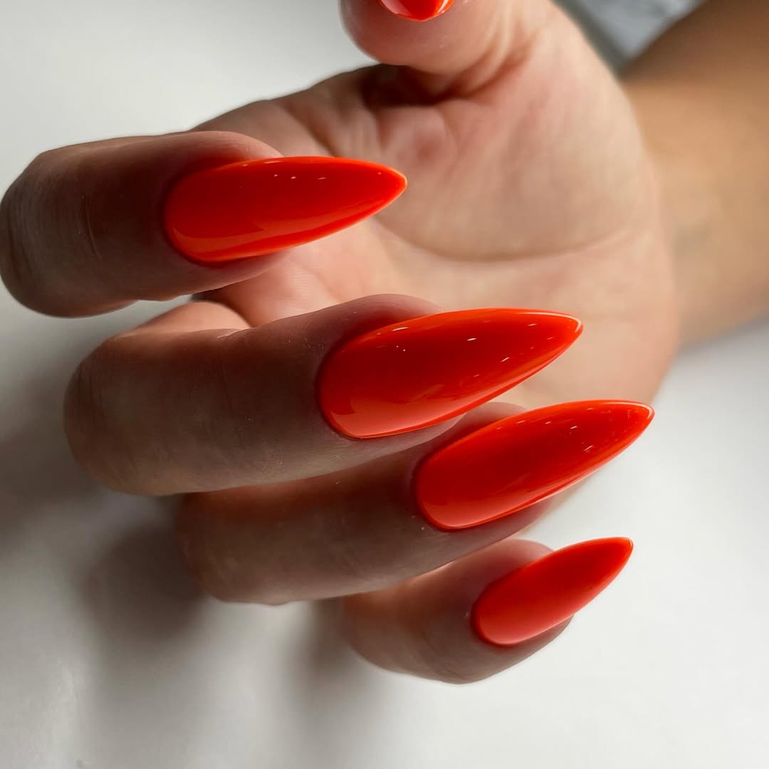 Vibrant Orange Glossy Stiletto Nails