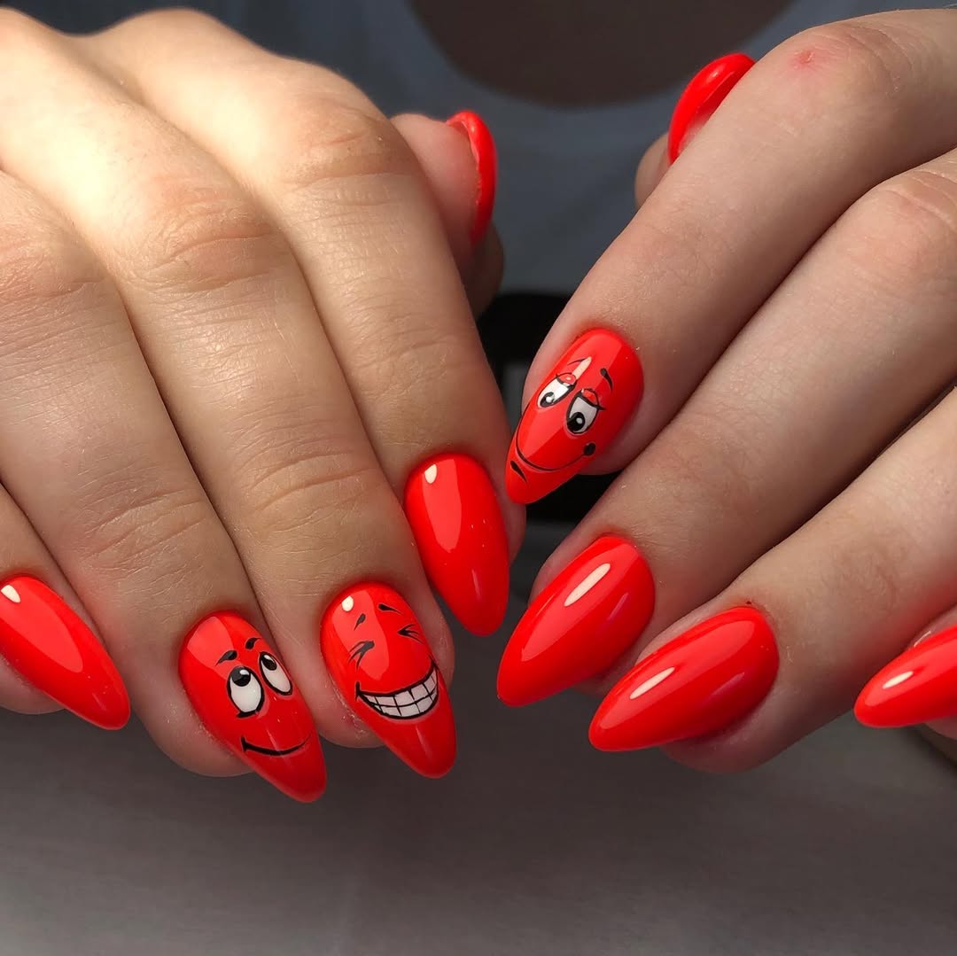 Vibrant Red Cartoon Face Almond Nails