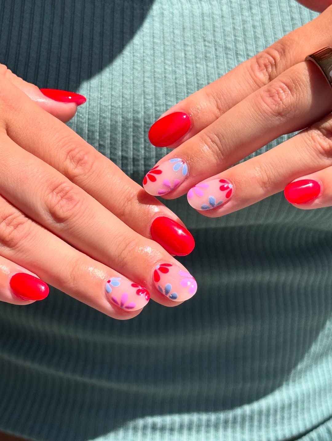 Vibrant Red With Playful Floral Mix And Match Nails