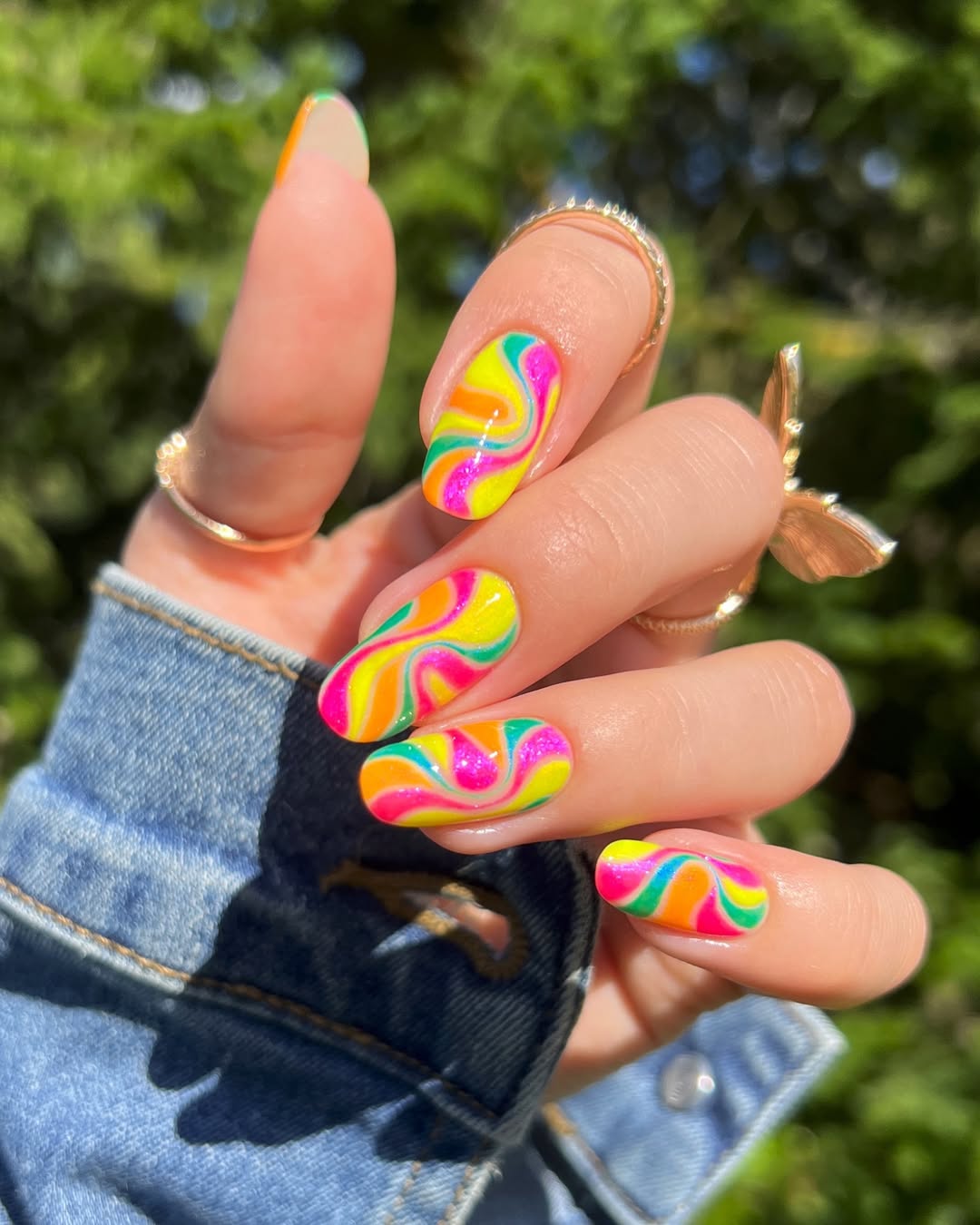 Vibrant Swirl Neons with Glitter Accents Short Oval Nails