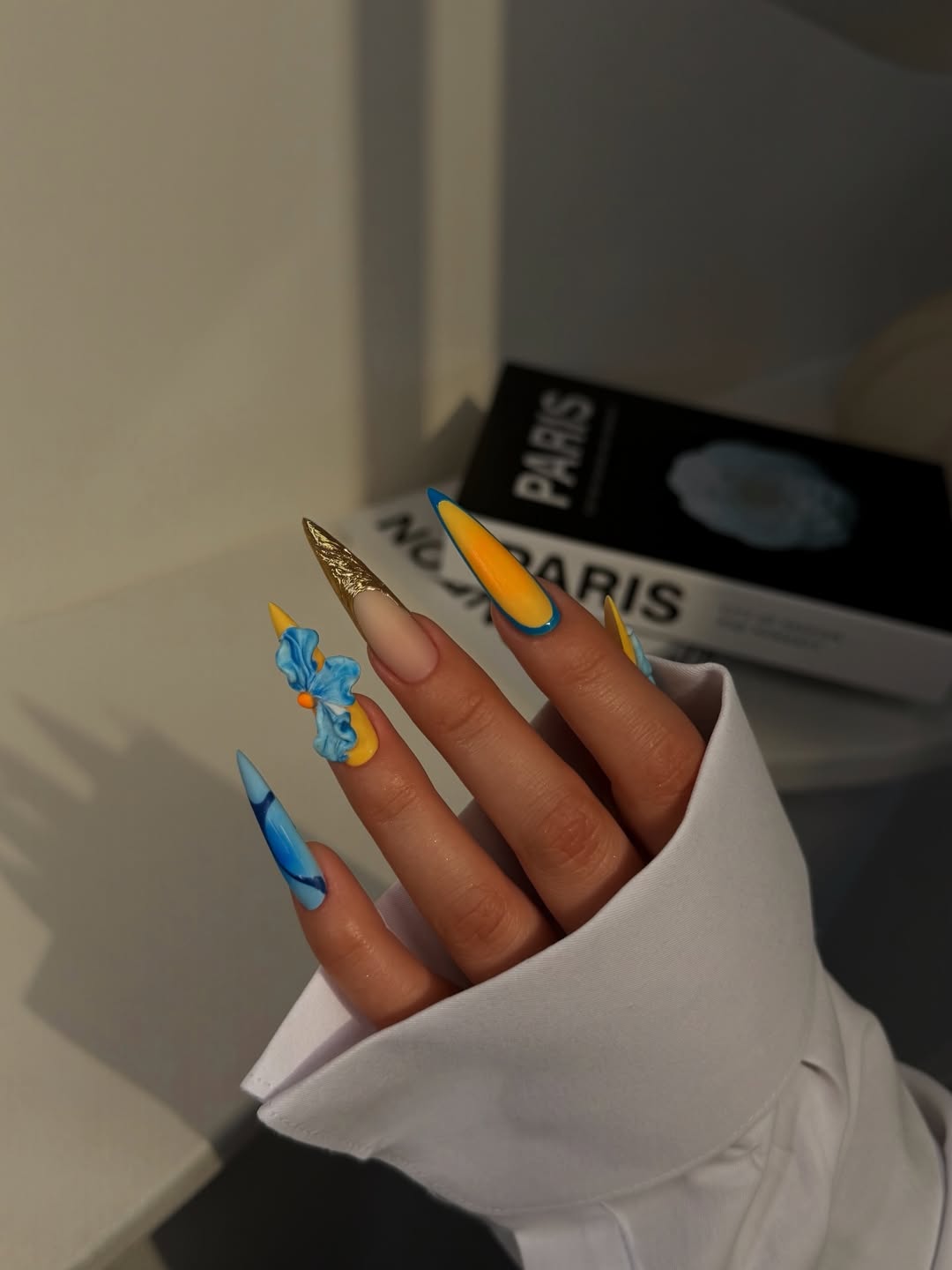 Vibrant Yellow and Blue Stiletto Nails with 3D Flowers