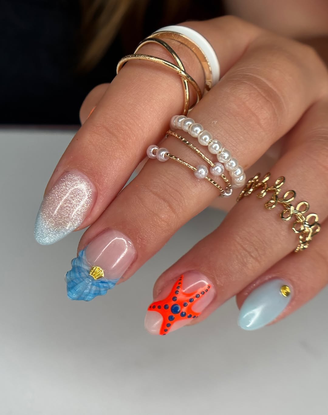 Whimsical Ocean Blues With 3D Seashell And Starfish Nails