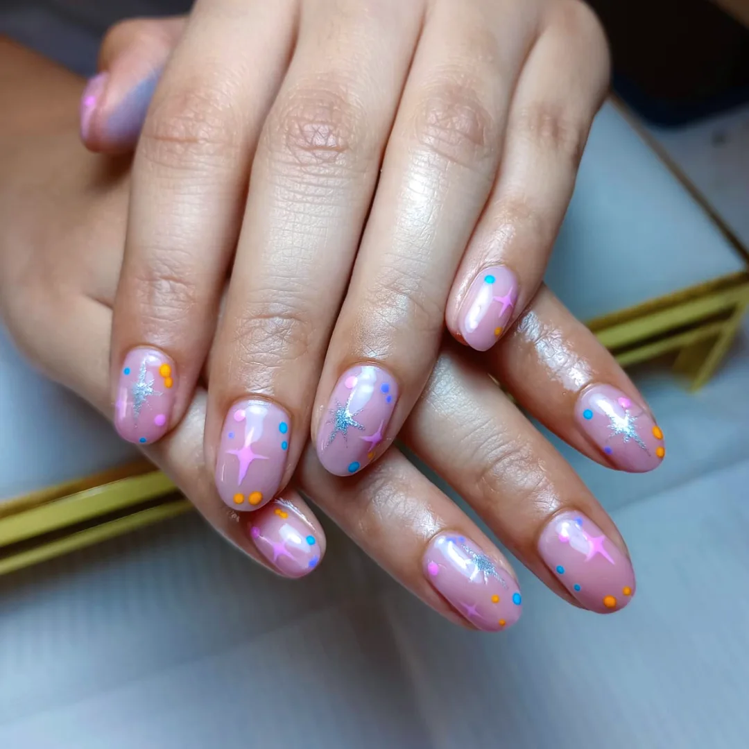 Whimsical Pink Jelly Nails With Sparkly Stars And Polka Dots