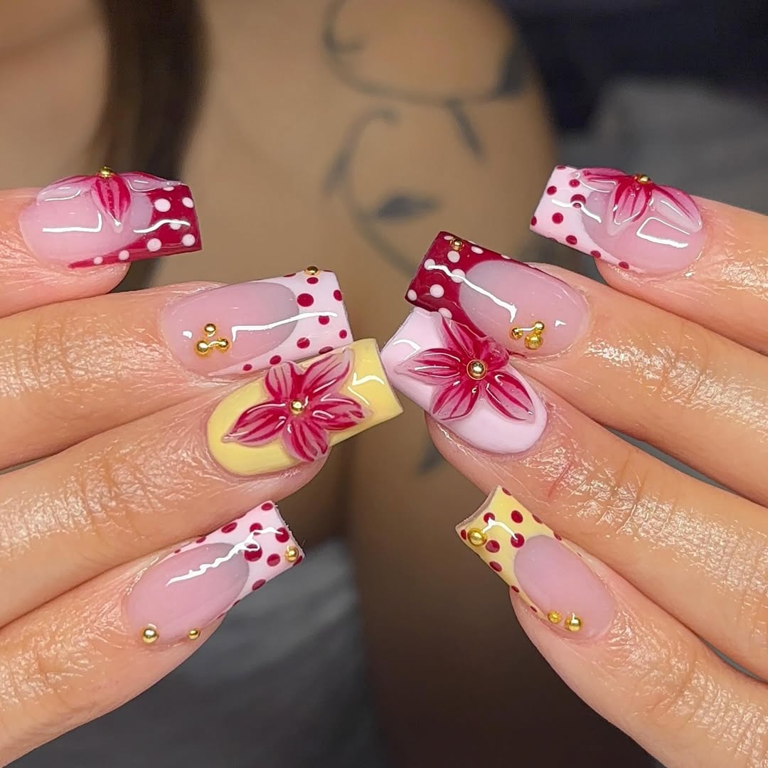 Whimsical Red Polka Dot French Nails with Vibrant 3D Flowers
