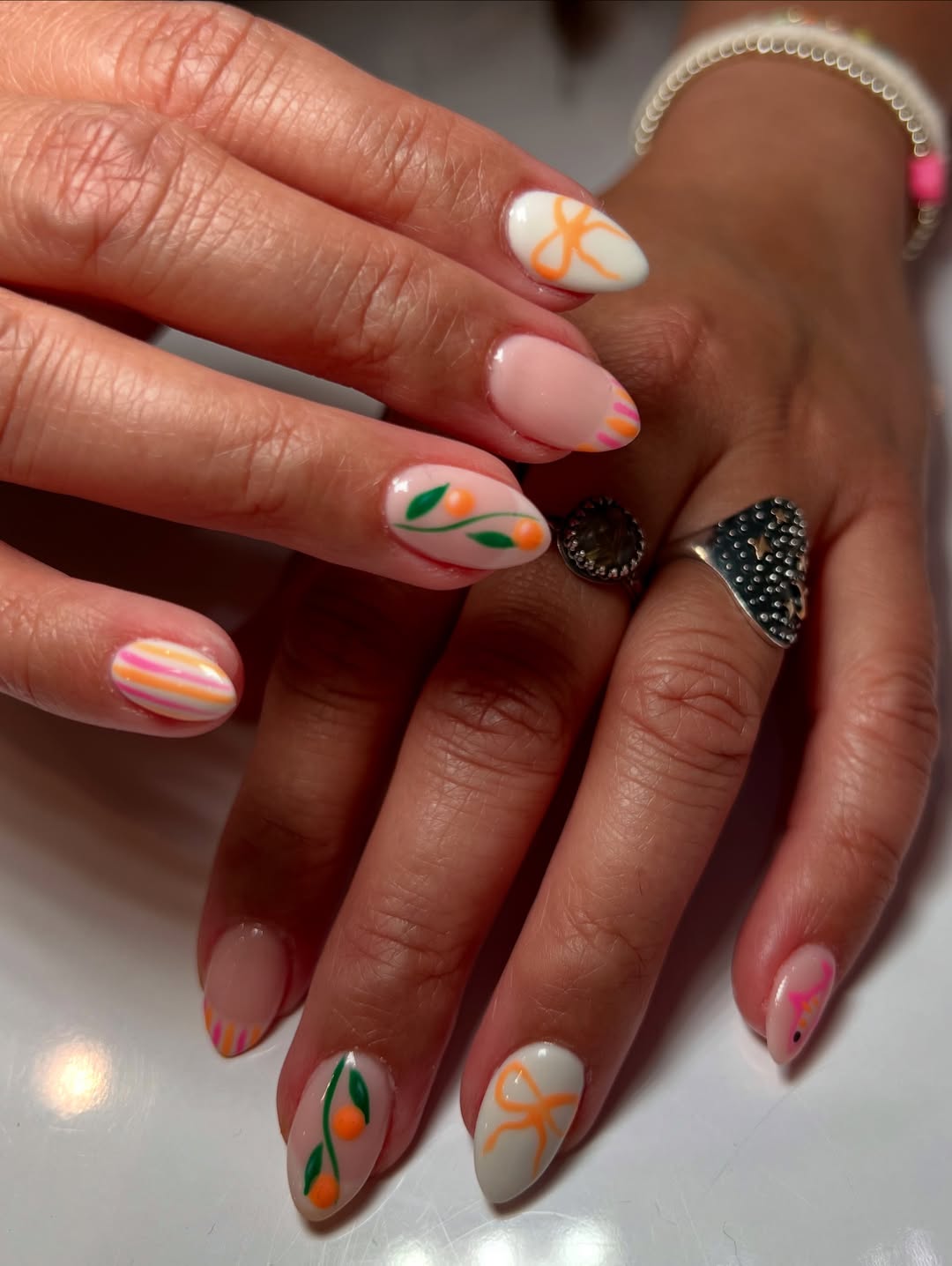 Whimsical Summer Fruit And Bow Almond Nails