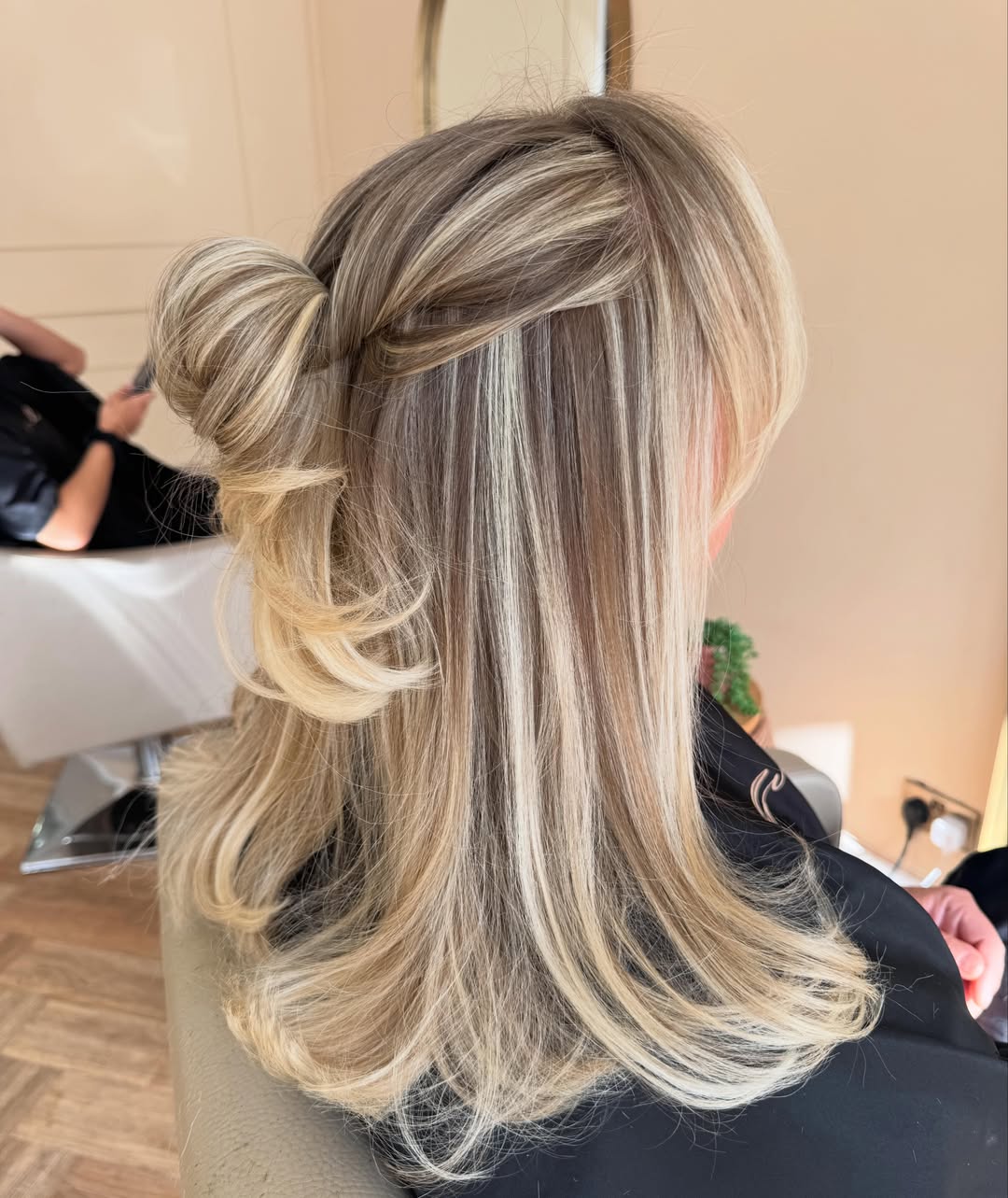 Beach Blonde Half-Up Bun with Curtain Bangs