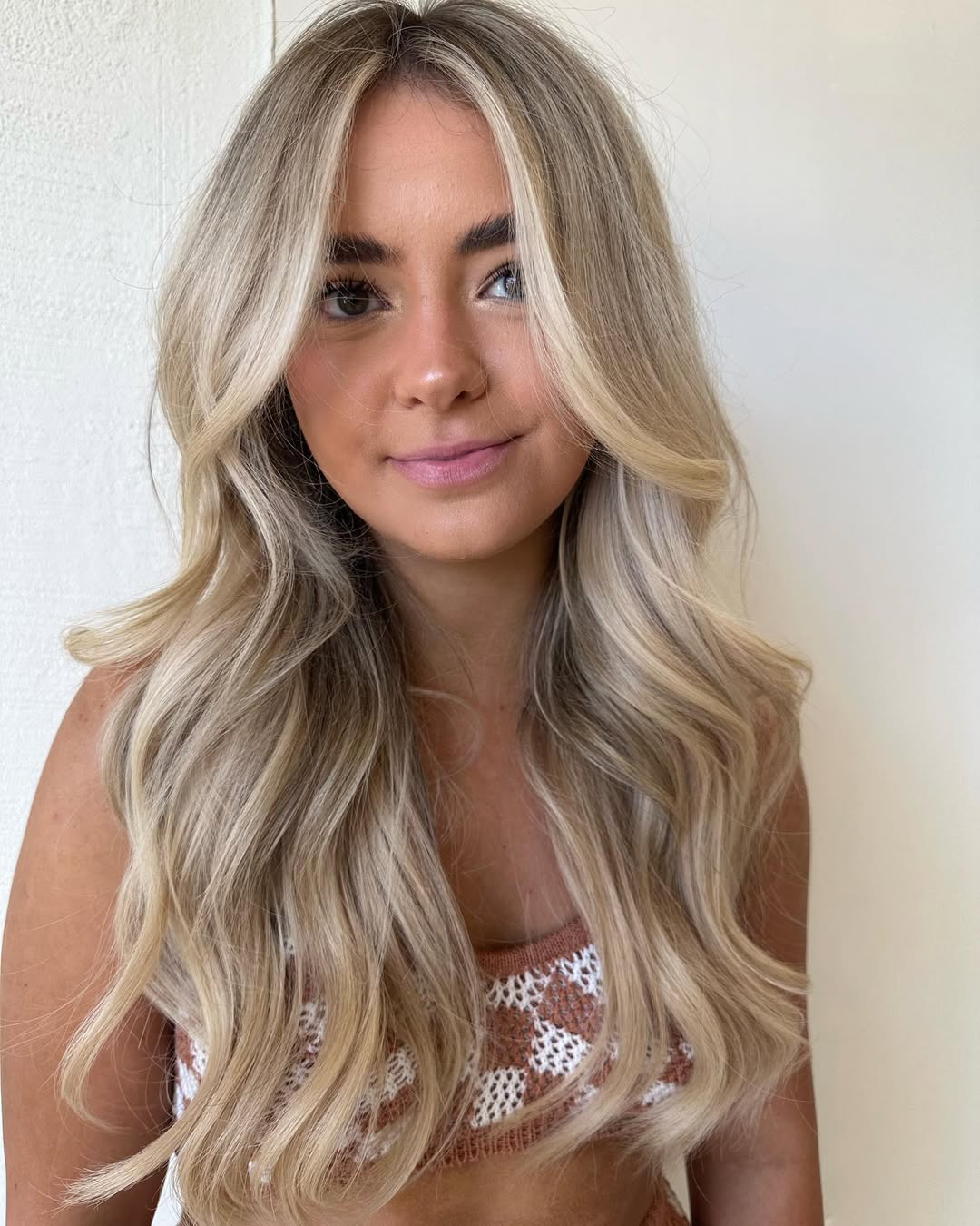 Beachy Blonde Waves With Face Framing Layers