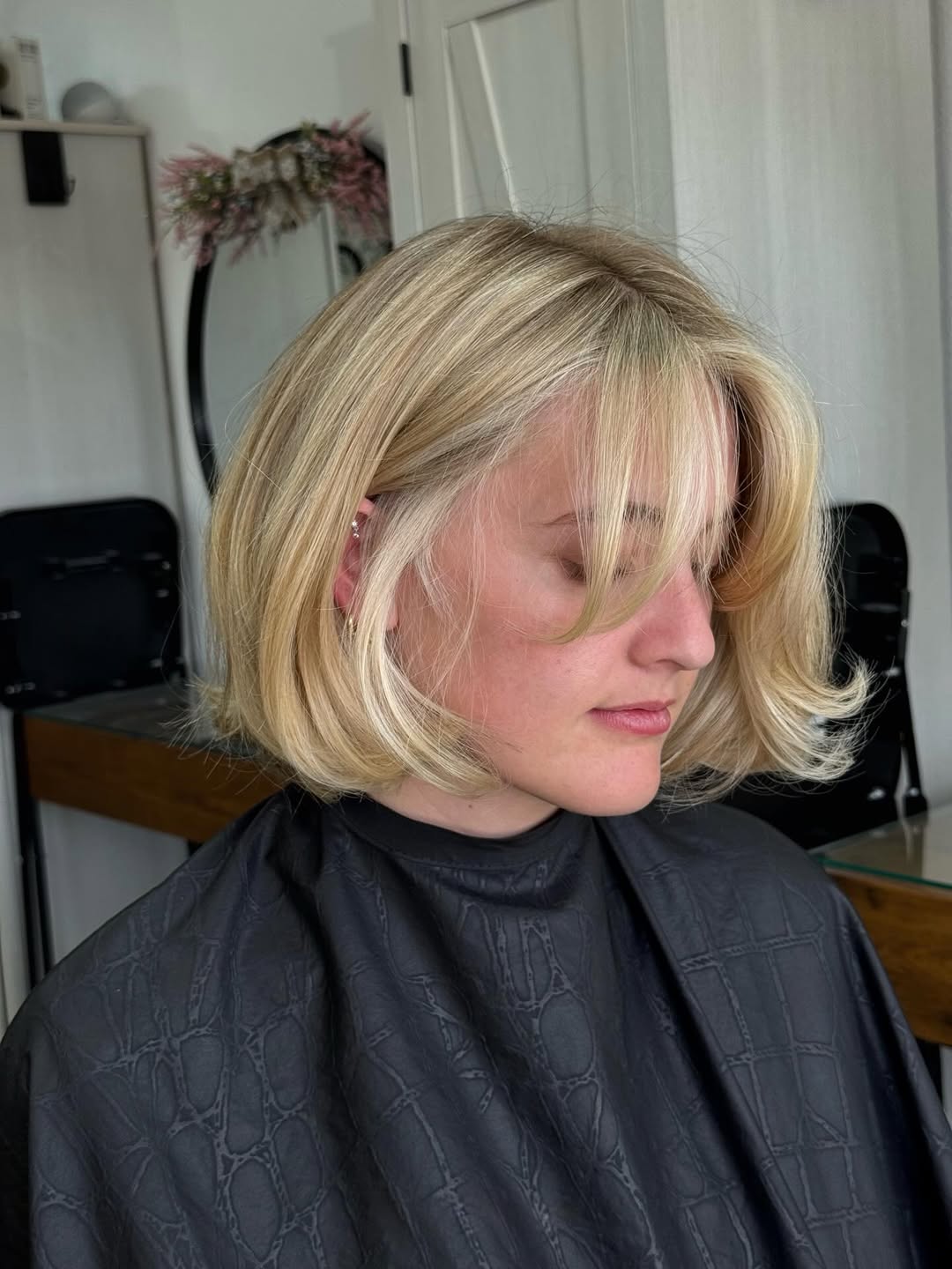 Blonde Bob With Wispy Bangs And Soft Waves
