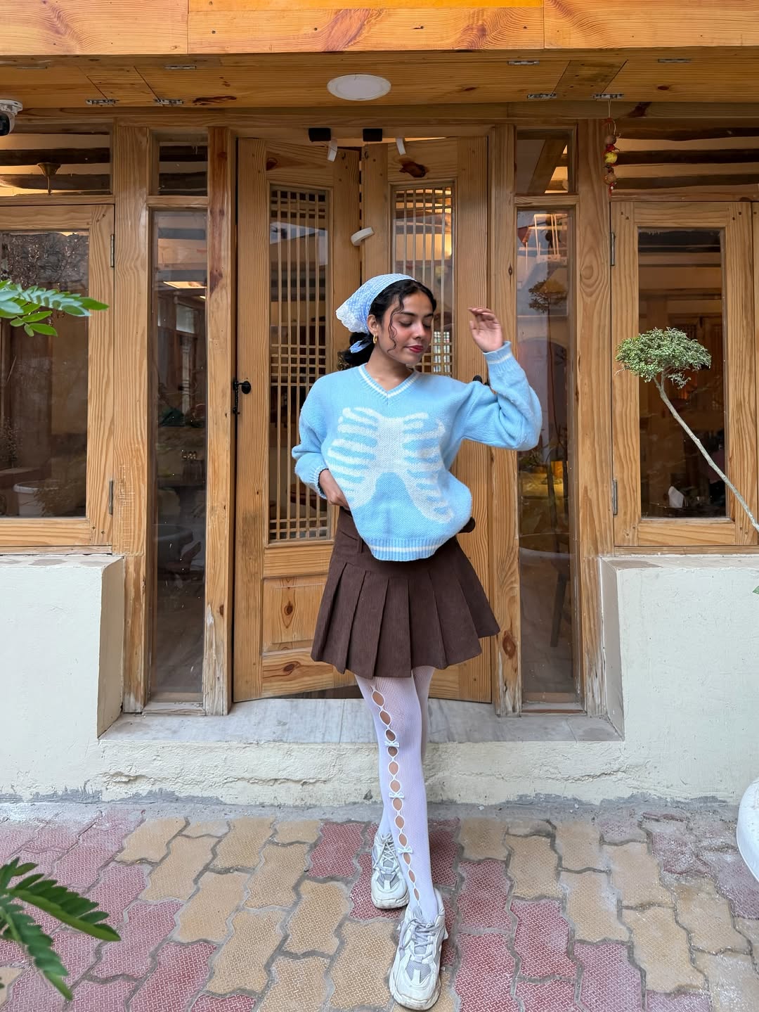 Blue Skeleton Sweater With Brown Pleated Skirt