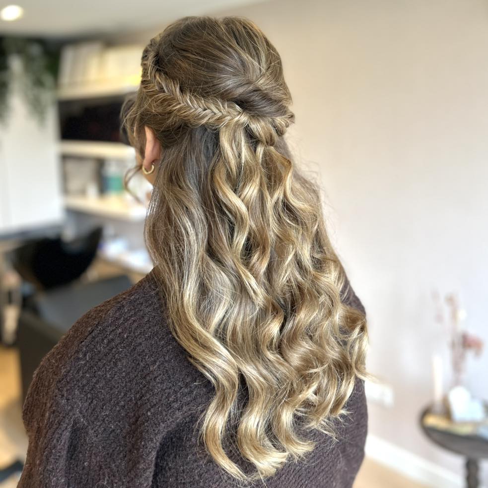 Boho Braided Half Updo With Loose Waves
