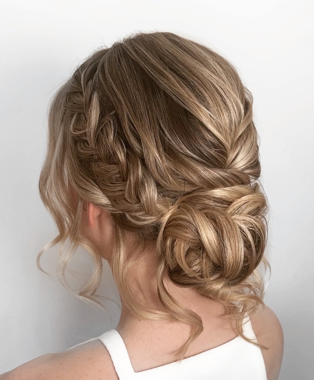 Boho Braided Updo With Loose Blonde Curls