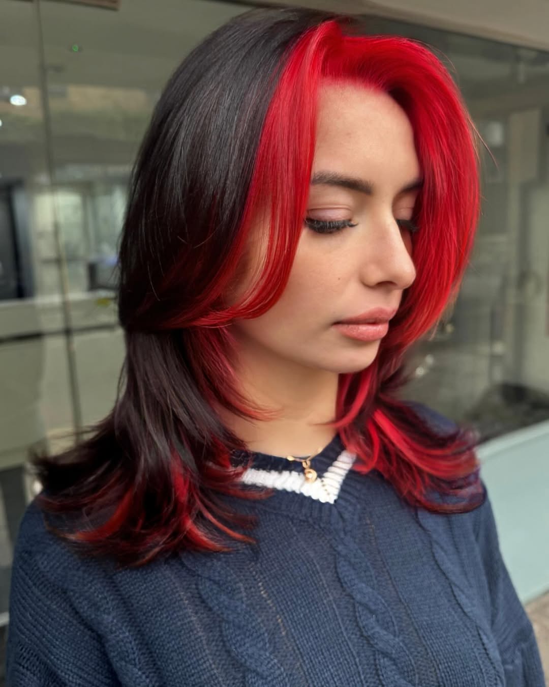 Bold Red Peekaboo With Face-Framing Layers