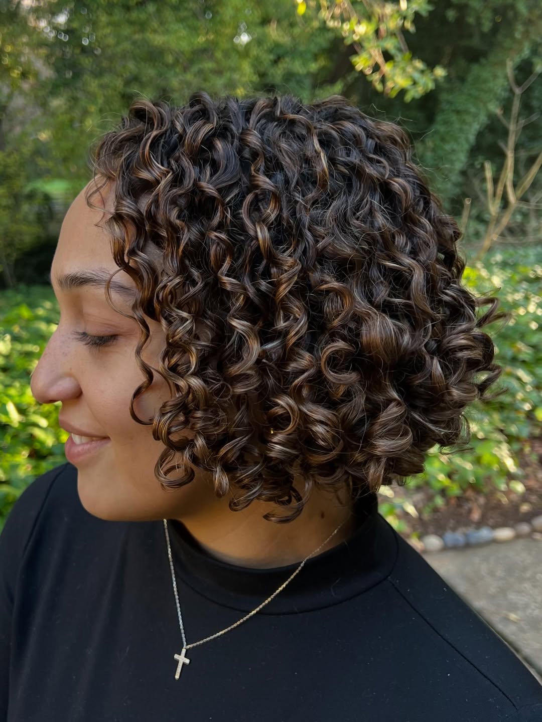 Bouncy Curly Bob With Warm Honey Highlights
