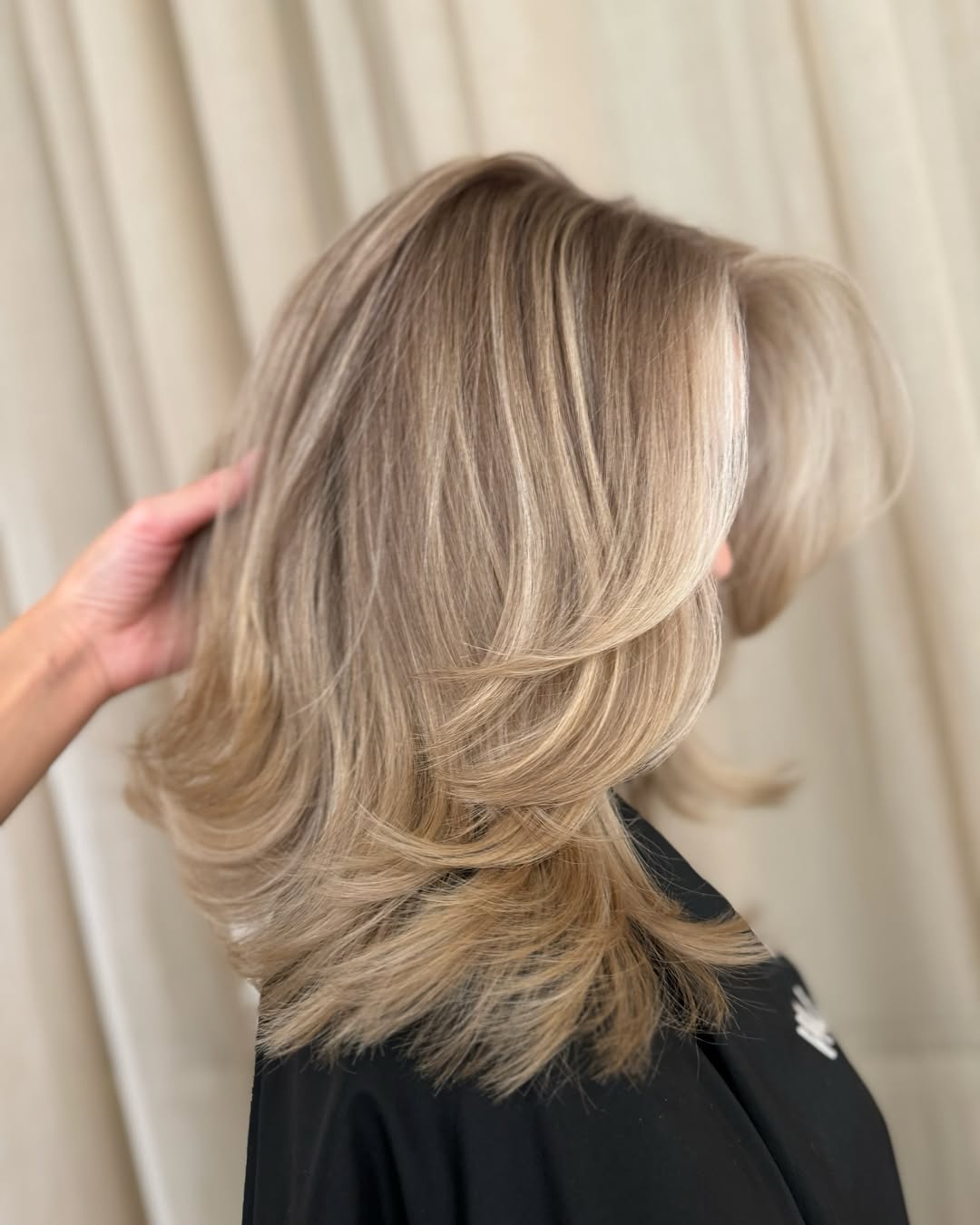 Bouncy Layered Lob With Honey Blonde Highlights