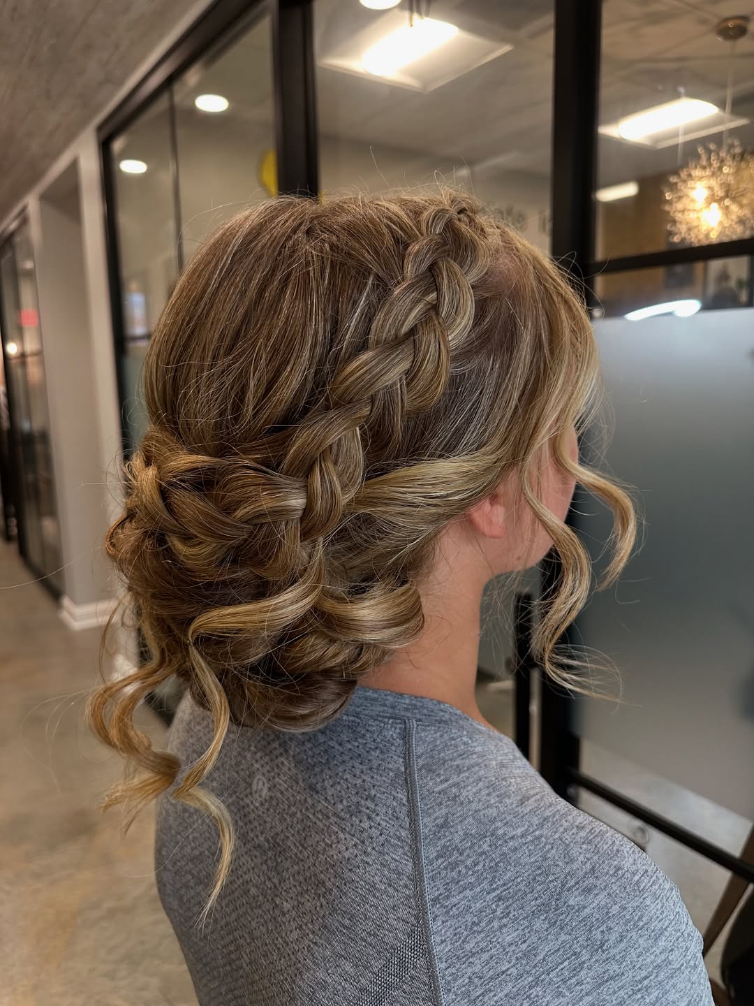 Braided Bohemian Updo With Tousled Curls