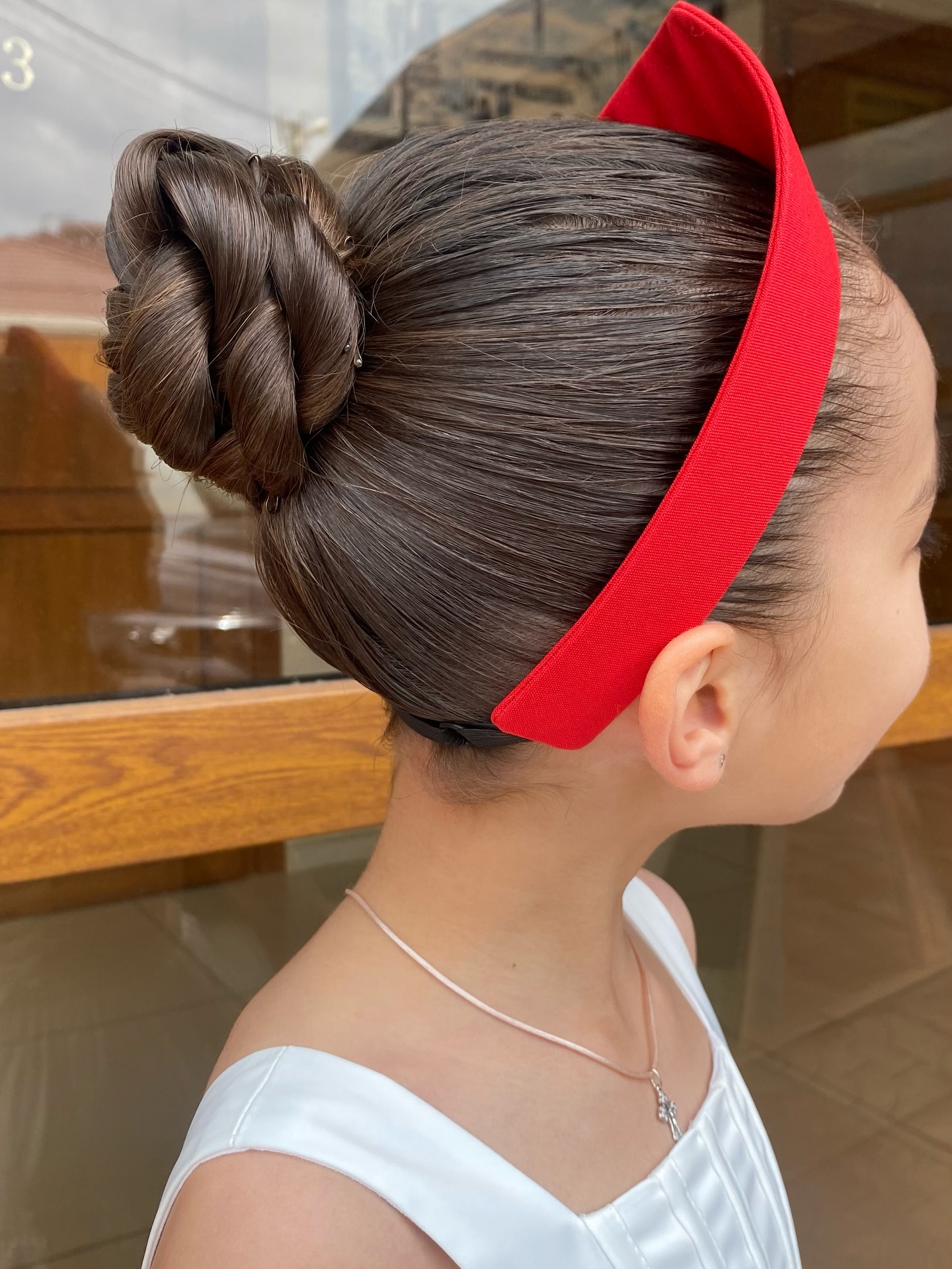 Braided Crown Bun With Bold Red Headband