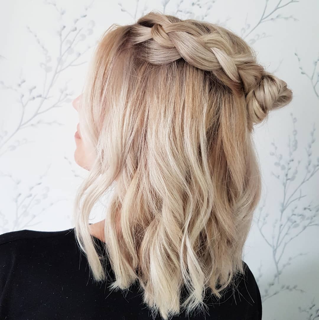 Braided Crown With Loose Waves And Twisted Bun