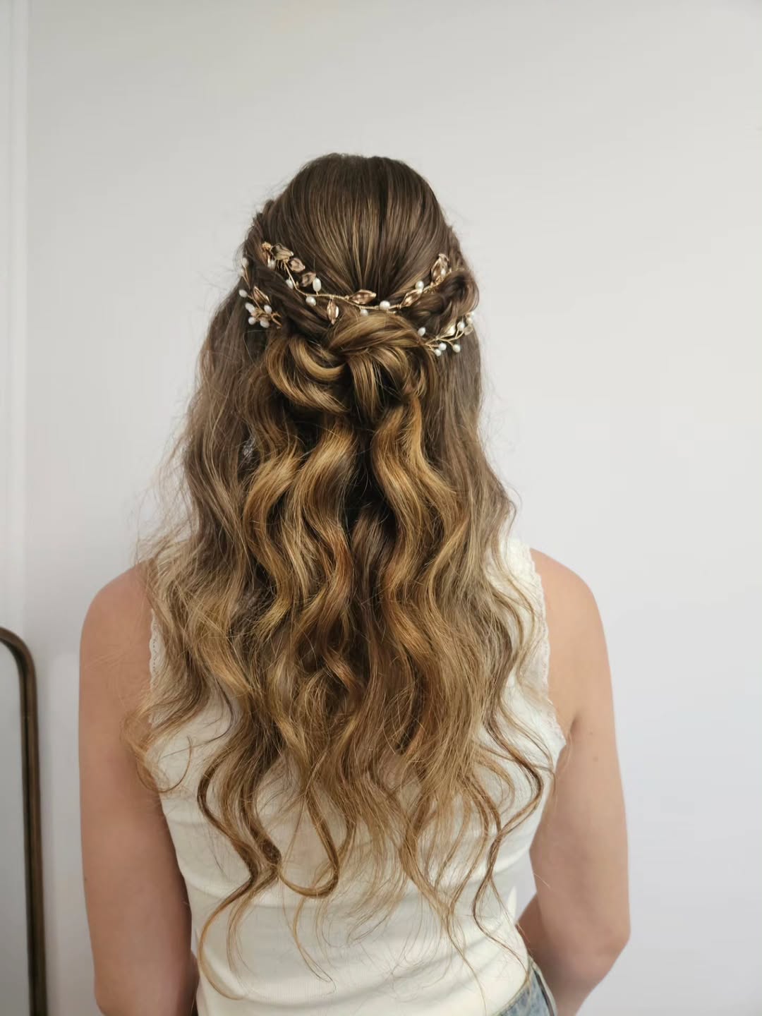 Braided Half-Up With Twists And Floral Accent