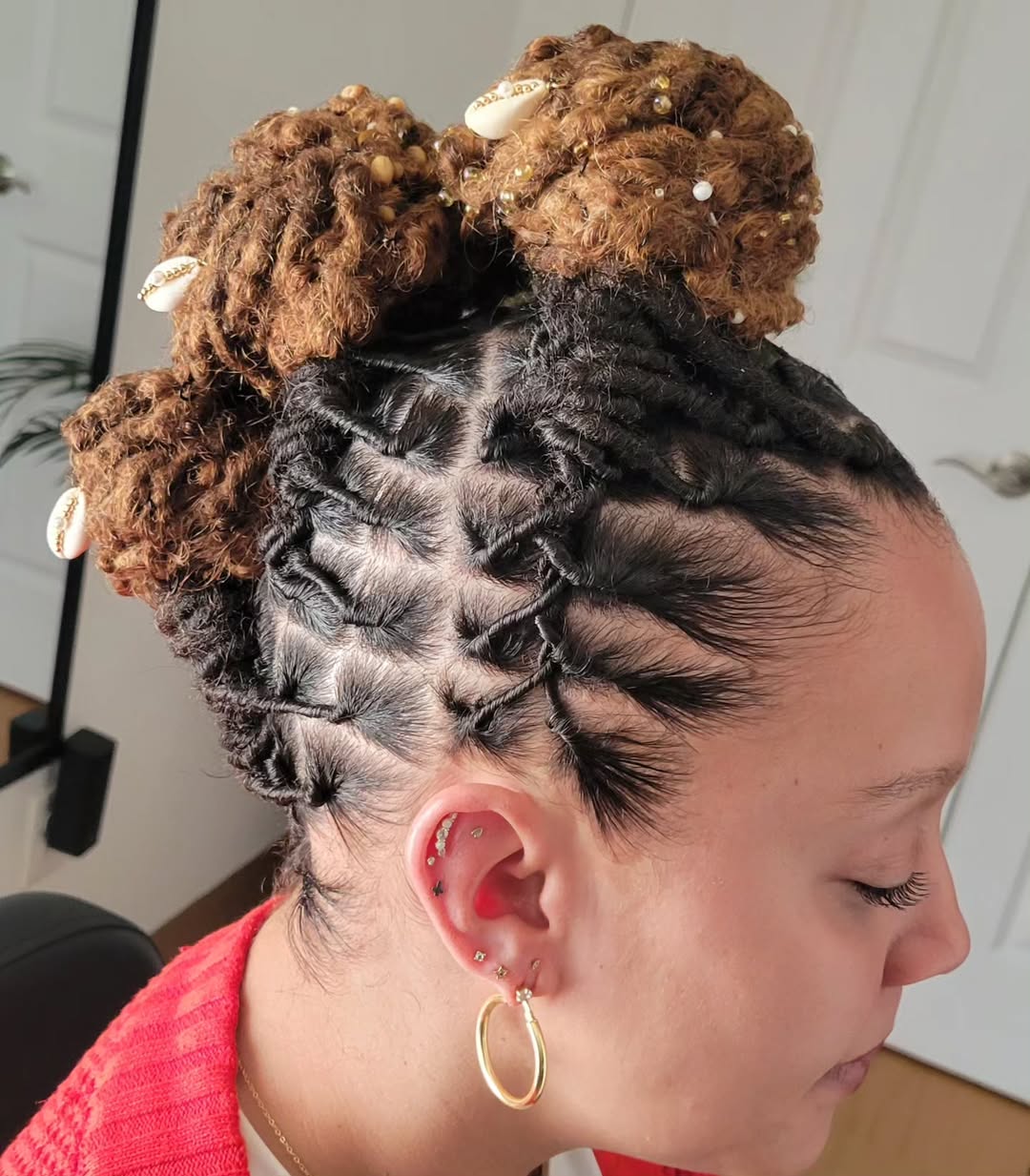 Braided Loc Updo With Cowrie Shell Accents
