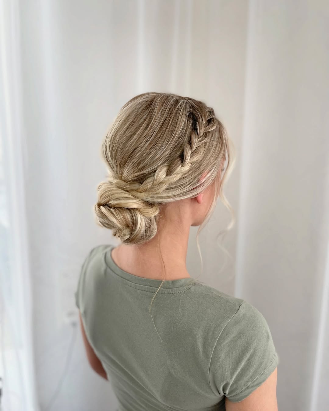 Braided Low Bun With Face Framing Pieces