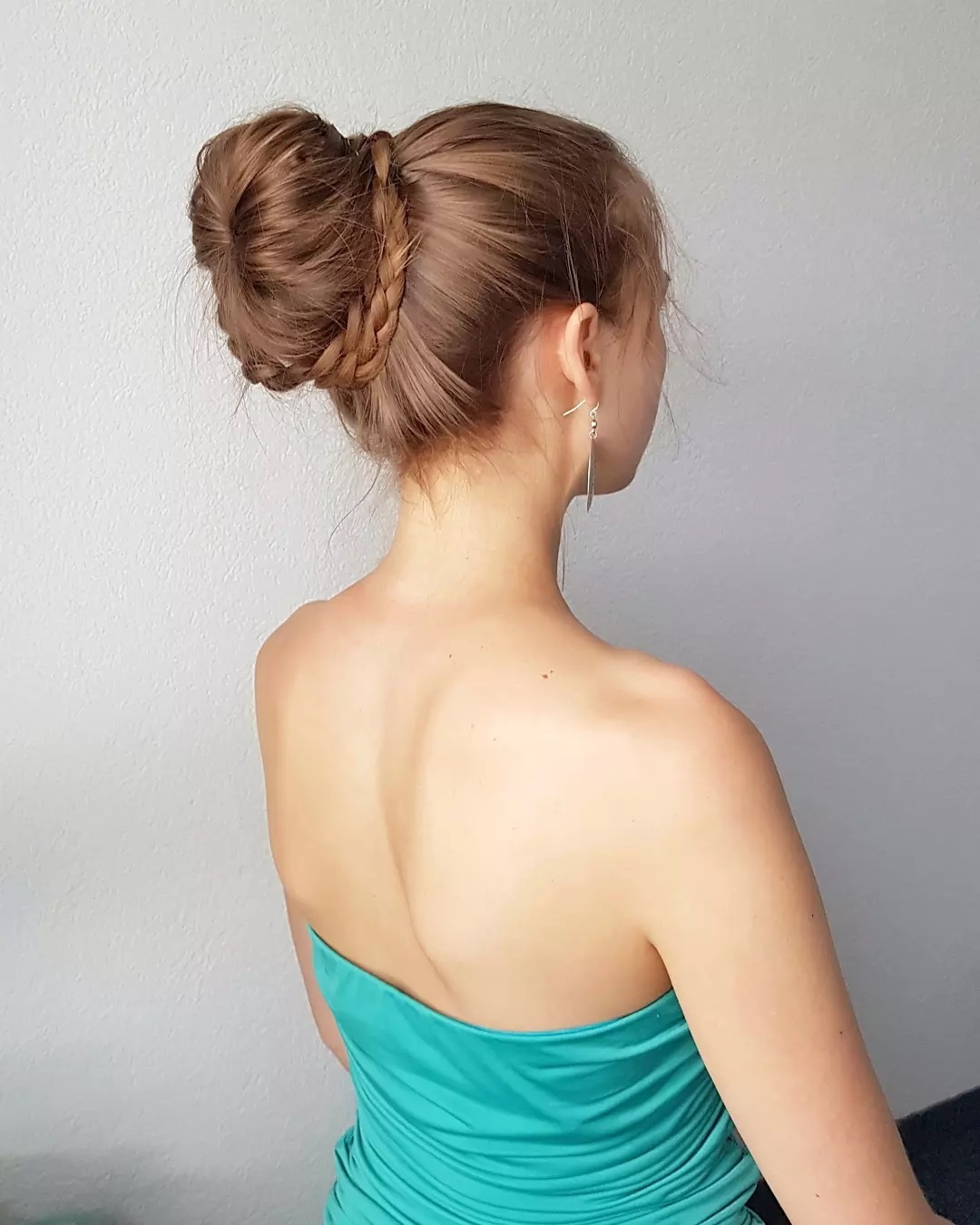 Braided Top Knot With Loose Strands