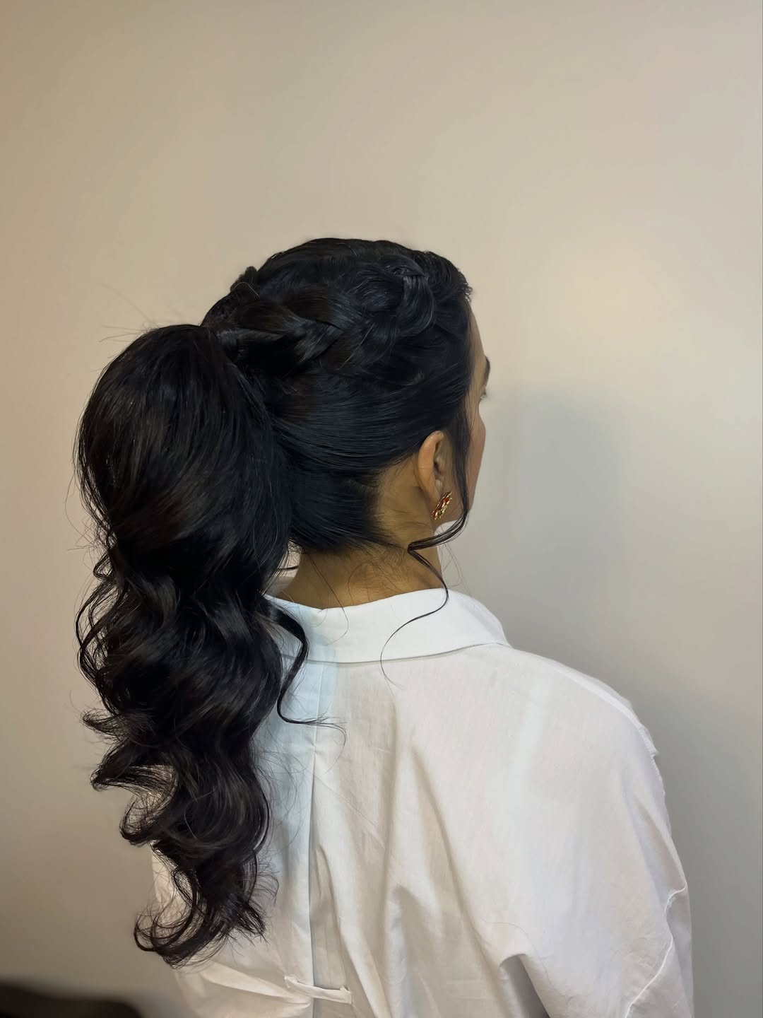 Braided Top Side-Swept Wavy Ponytail