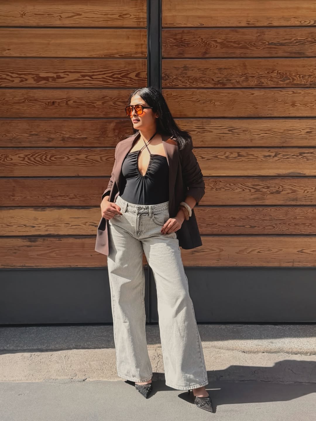 Brown Blazer With Black Halter Top And Wide Leg Jeans