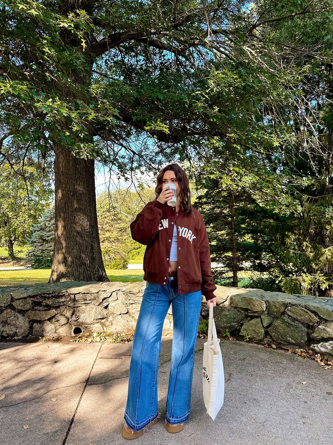 Brown Bomber Jacket With High-Waisted Flare Jeans